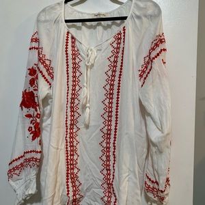 White and red embroidered long sleeve shirt. Never worn in great condition